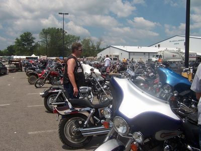 CAVEMAN WAITING FOR DEUCE TO LOCK THE BIKES