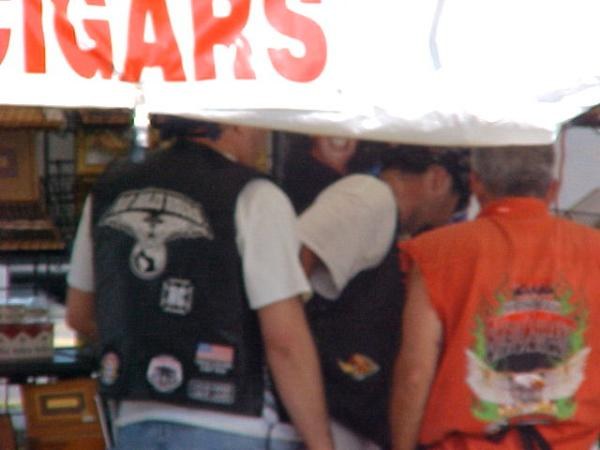 Couple of unidentified fellow NRR buying cigars