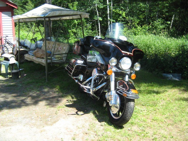 yes a six pack sitting on the seat and a no rule rider sticker on the windsheild what more do you need